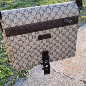 Elevate your everyday with this authentic Gucci GG canvas messenger — a timeless
